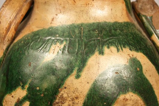 The stamped mark of C.A. Haun appears on the jar’s shoulder underneath a splash of copper oxide glaze. Image courtesy Case Antiques.